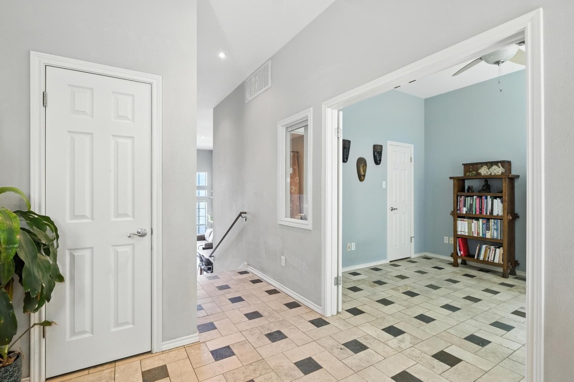 2918 Ranch Road 620, Unit 185 Austin, TX 78734 - Photo 6 of 39 a bedroom with a dresser and a shower