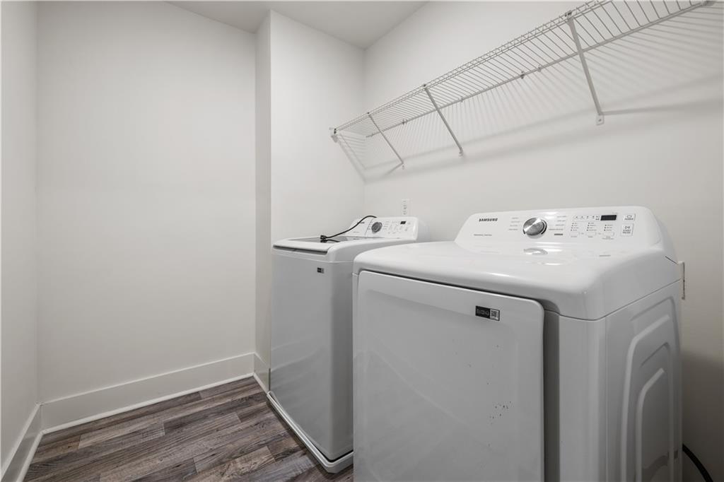 7690 Baron Road Fairburn, GA 30213 - Photo 19 of 29 a utility room with dryer and washer
