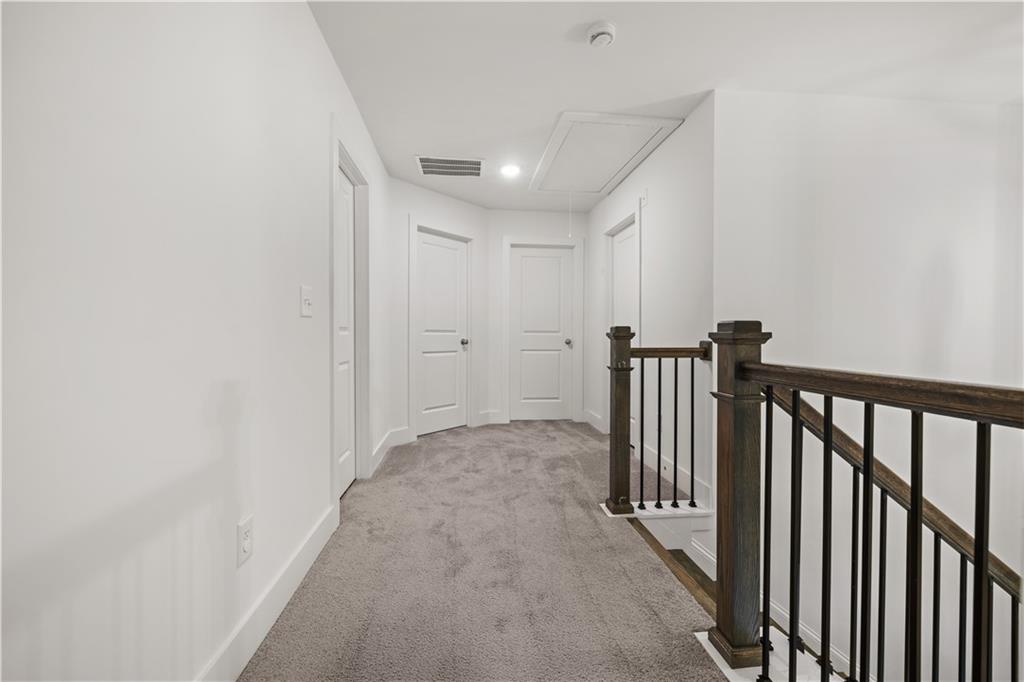 7690 Baron Road Fairburn, GA 30213 - Photo 22 of 29 a view of hallway with stairs