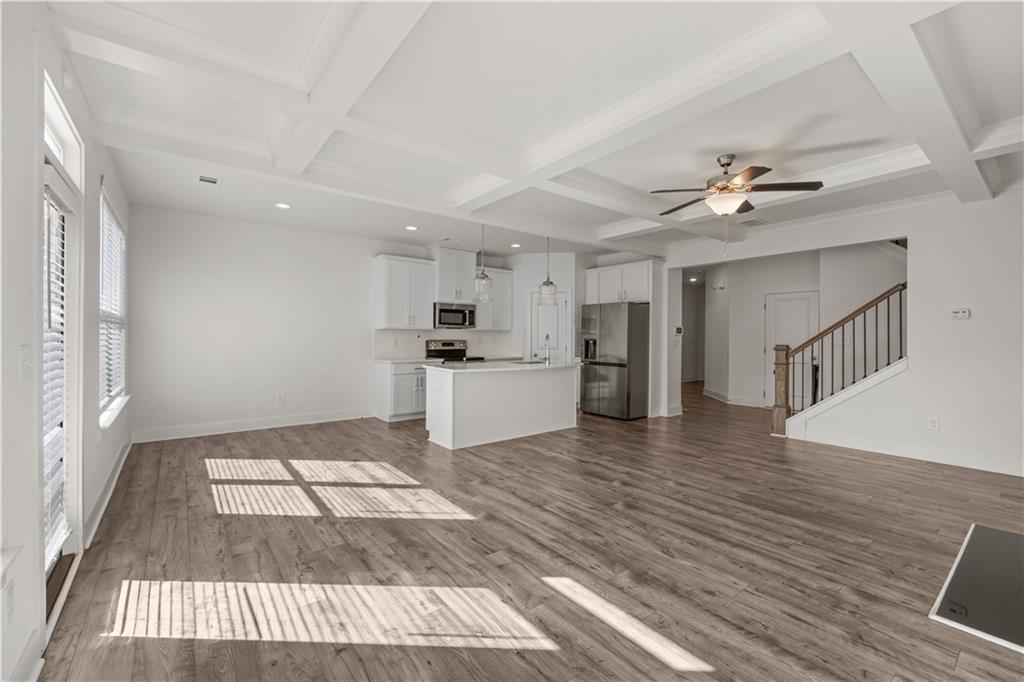 7690 Baron Road Fairburn, GA 30213 - Photo 5 of 29 a view of kitchen with sink and refrigerator