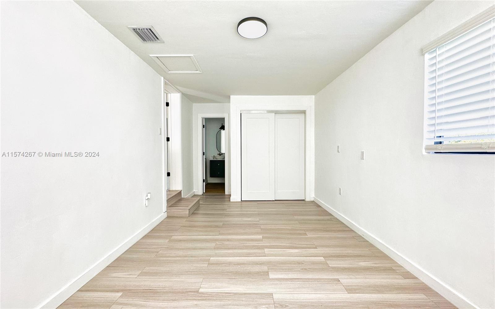 7040 Southwest 17th Terrace Miami, FL 33155 - Photo 13 of 26 a view of an empty room