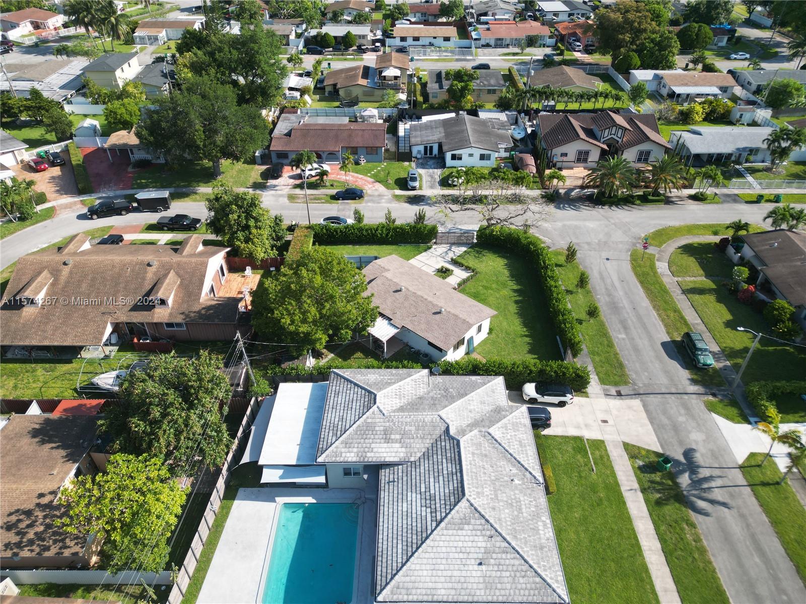 7040 Southwest 17th Terrace Miami, FL 33155 - Photo 20 of 26 an aerial view of residential houses with outdoor space