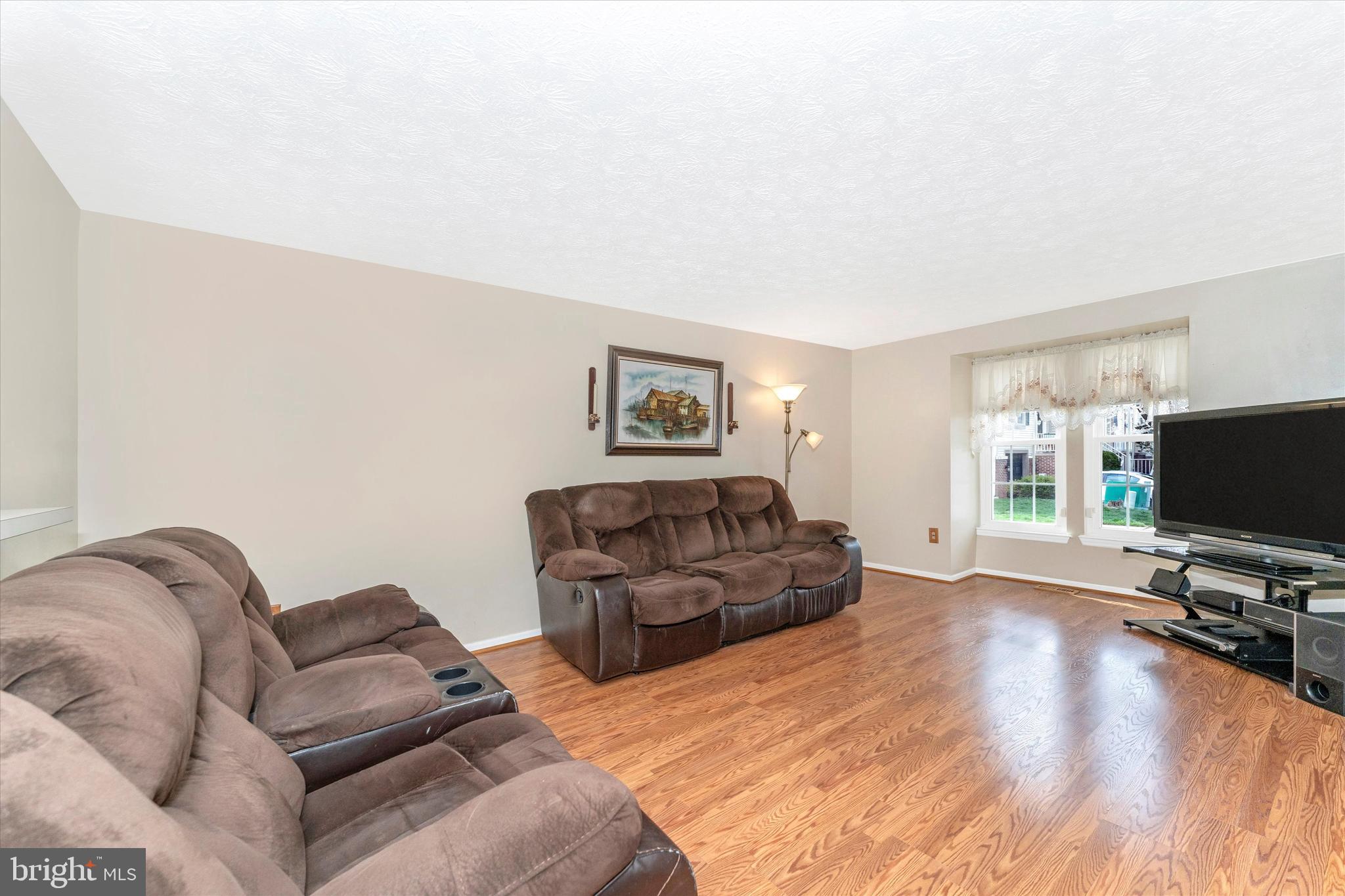 507 Goldspire Circle Frederick, MD 21703 - Photo 4 of 41 Living room with laminate floor