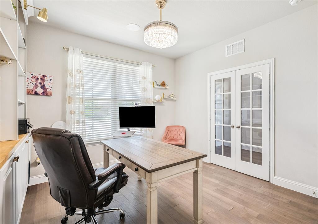 11852 Toppell Trail Fort Worth, TX 76052 - Photo 23 of 32 a view of a workspace with furniture and a window