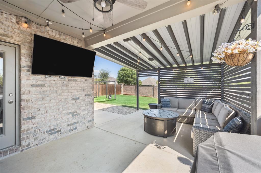 11852 Toppell Trail Fort Worth, TX 76052 - Photo 29 of 32 a view of a porch with furniture