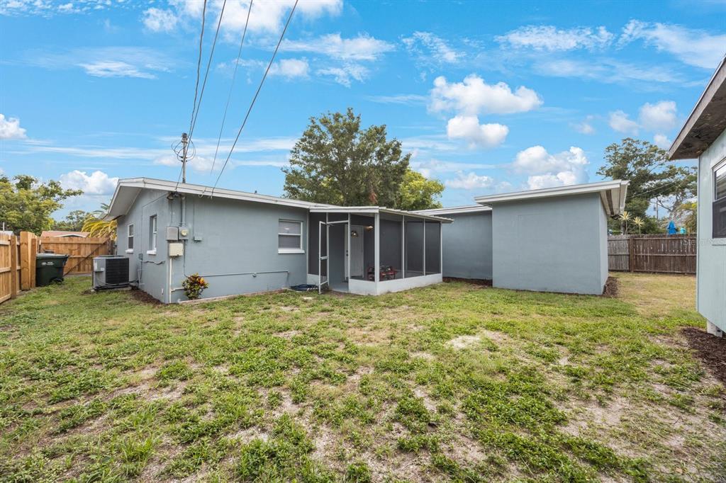 3336 20th Avenue Southwest Largo, FL 33774 - Photo 28 of 37 a house view with a backyard space