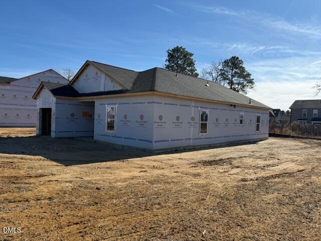 20 Colorado Court Spring Lake, NC 28390 - Photo 2 of 6 a front view of a house with a yard