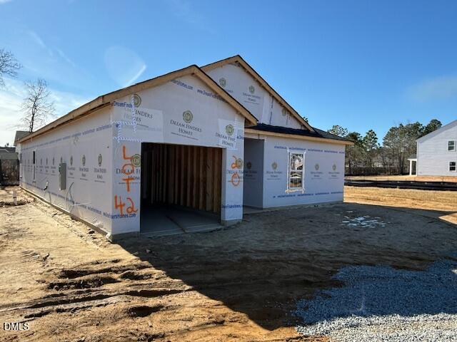 20 Colorado Court Spring Lake, NC 28390 - Photo 5 of 6 a view of a house with a wooden fence