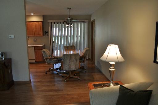 516 Spruce Road Bolingbrook, IL 60440 - Photo 4 of 16 a view of a livingroom with furniture and a lamp