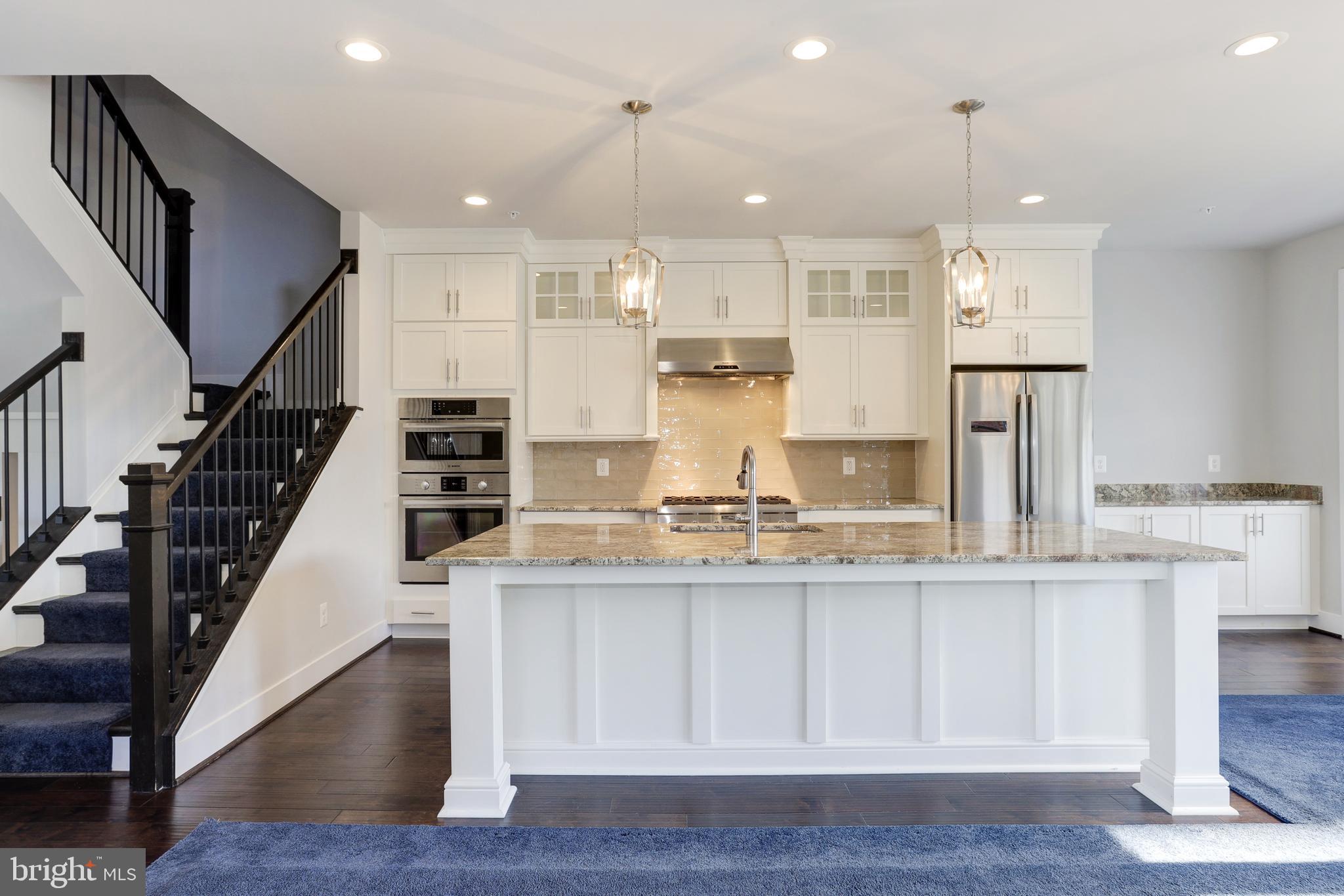 1973 Roland Clarke Place Reston, VA 20191 - Photo 10 of 38 Kitchen Island - Bar Seating