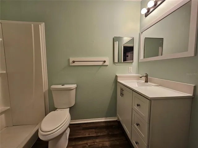 a view of a room with racks on the wall