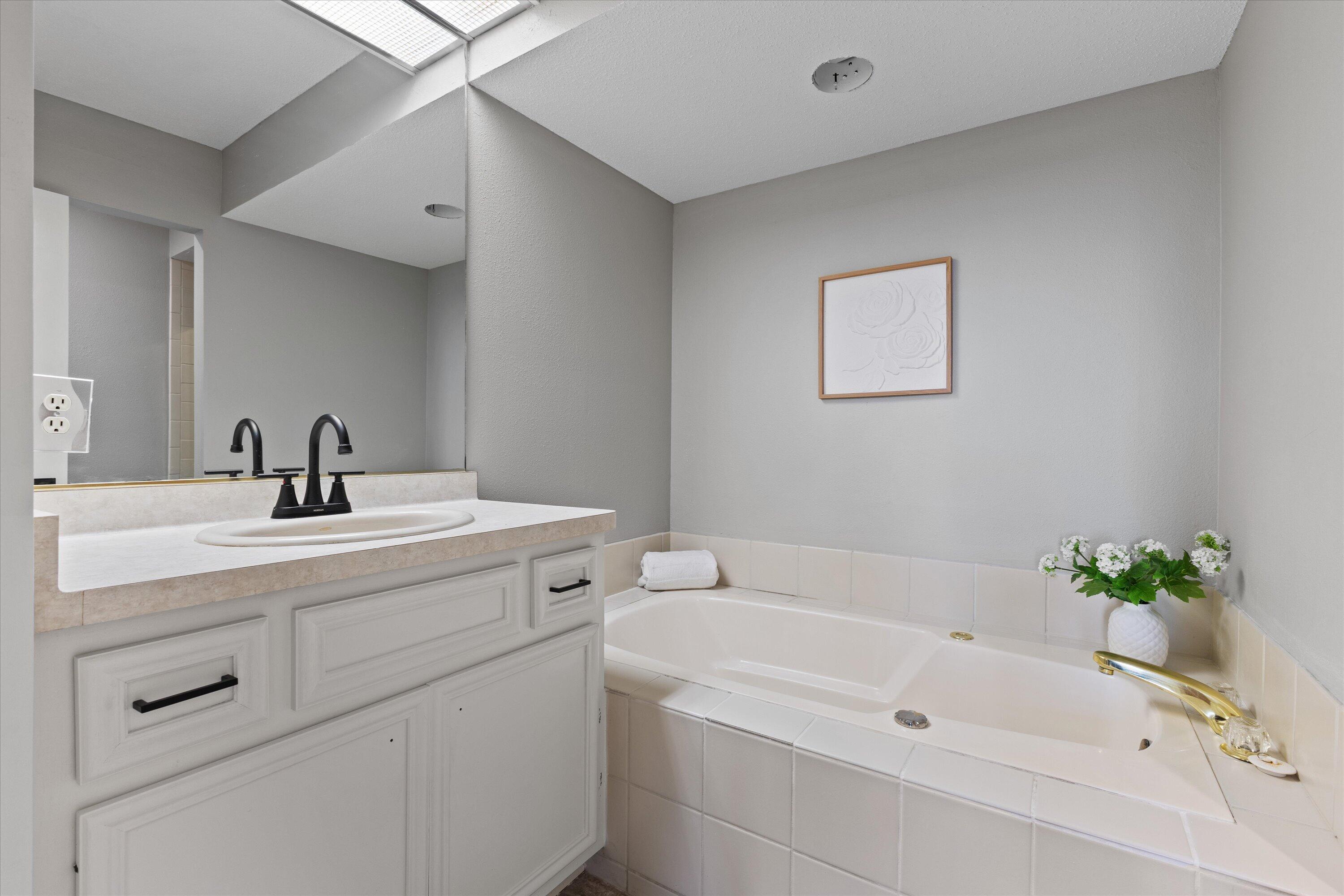 N14-w30046 High Ridge Road Delafield, WI 53072 - Photo 25 of 56 Master Bathroom with Double Vanity and Jet Tub