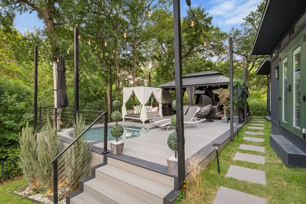 a view of swimming pool with lounge chair
