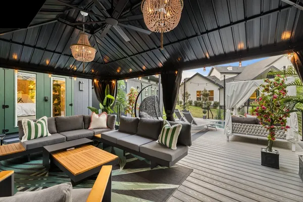 a view of a backyard with a tub