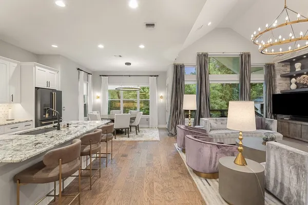 a view of a dining room with furniture window and outside view