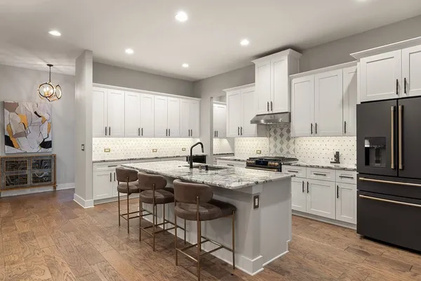 a view of a kitchen with a fireplace