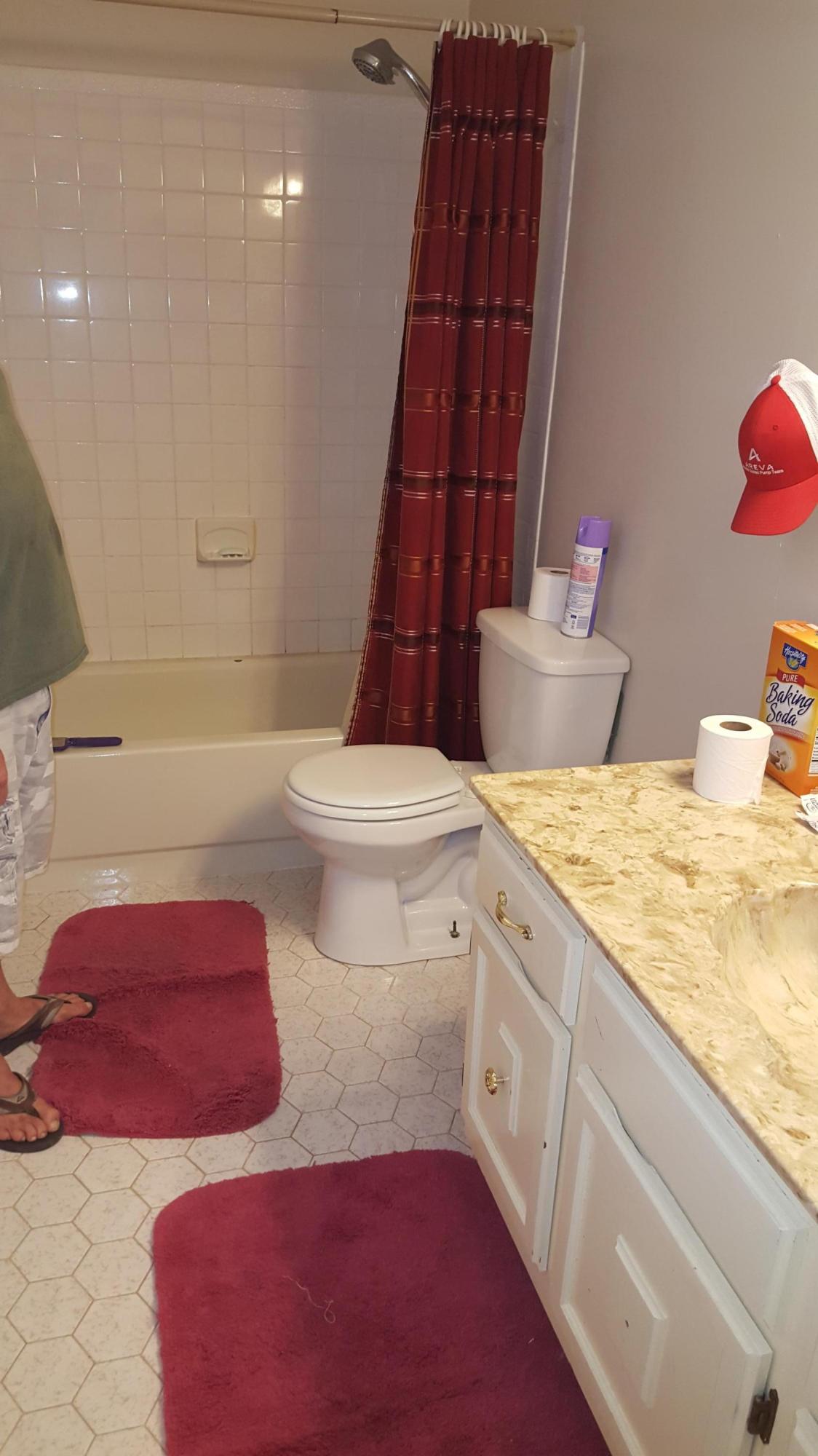 6459 Bischoff Road West Palm Beach, FL 33413 - Photo 12 of 12 a bathroom with a toilet sink and shower
