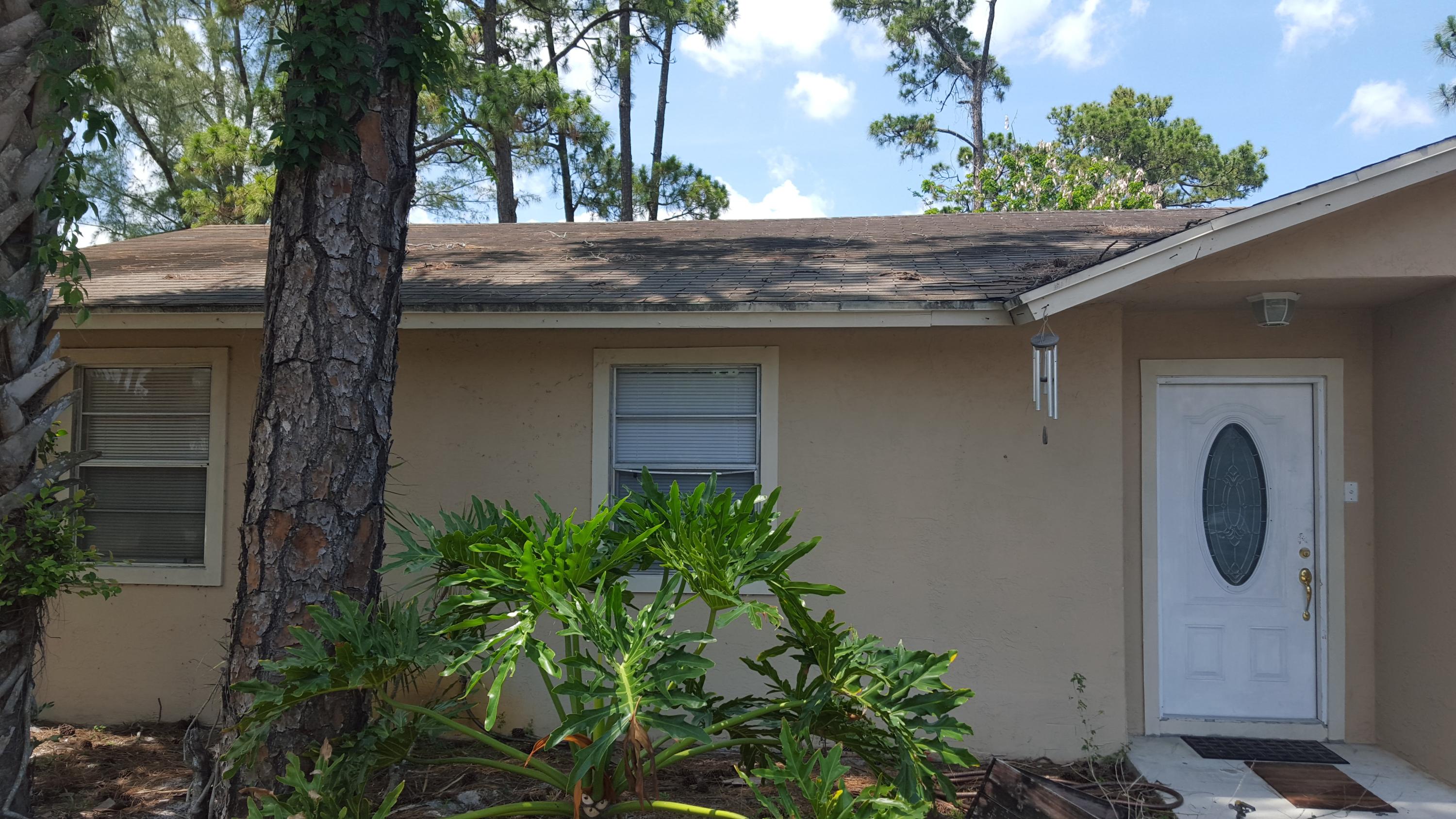 6459 Bischoff Road West Palm Beach, FL 33413 - Photo 9 of 12 a house view with a garden space