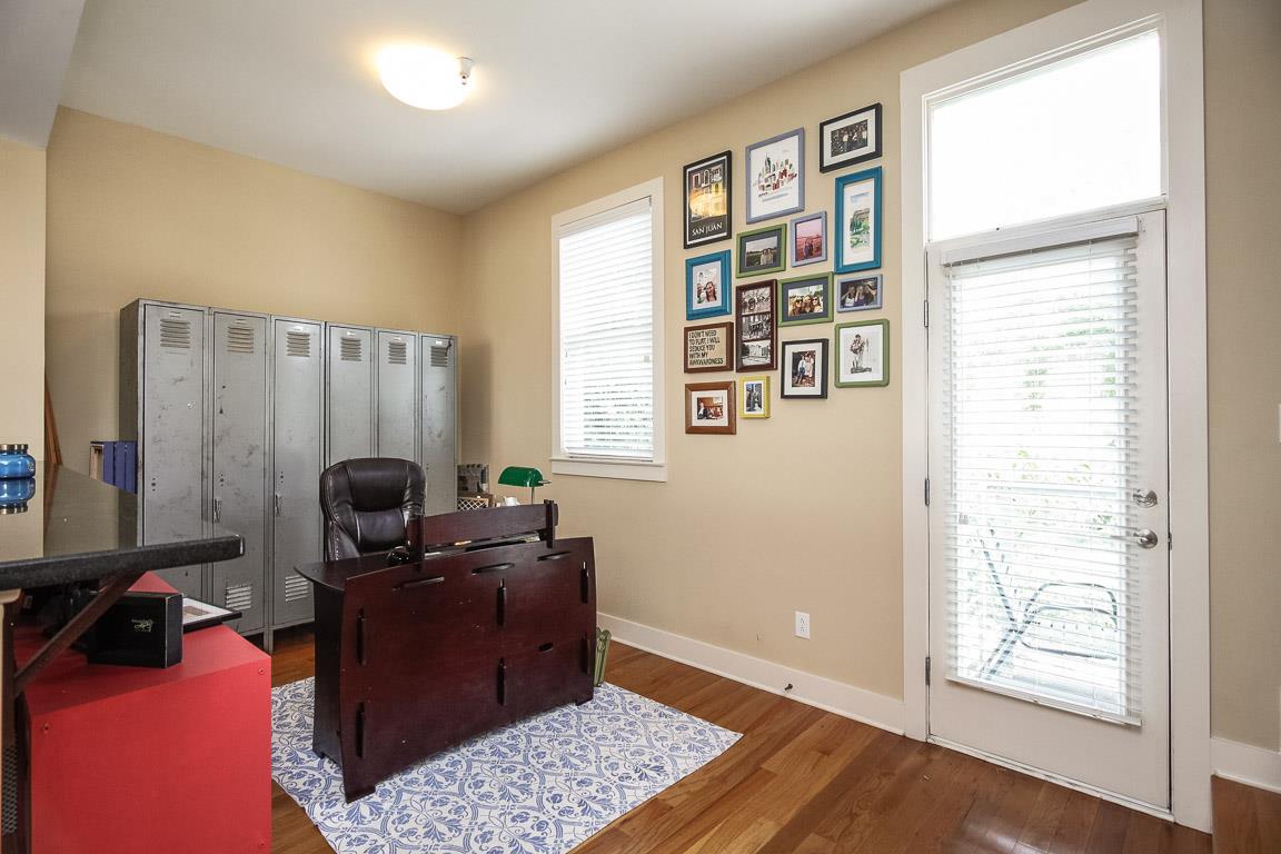 508 Madison Street, Unit 2 Nashville, TN 37208 - Photo 12 of 25 a view of a workspace with furniture and a window