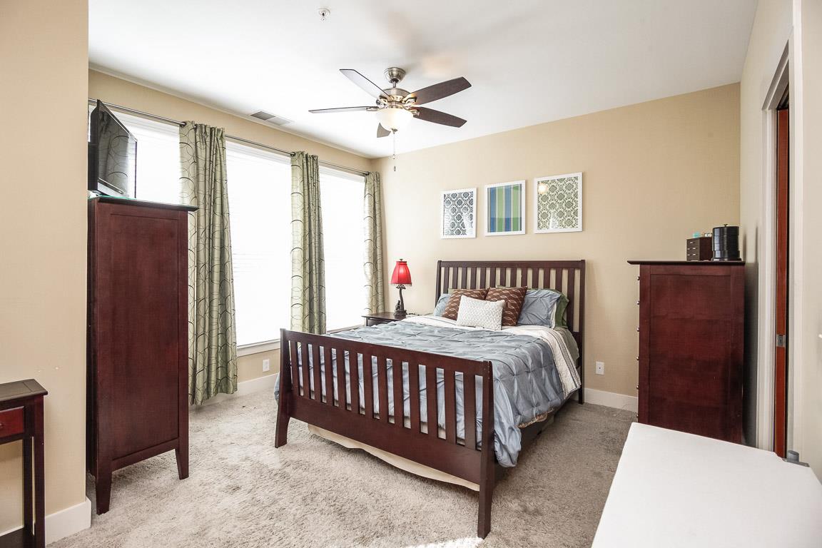 508 Madison Street, Unit 2 Nashville, TN 37208 - Photo 13 of 25 a bedroom with a bed and window