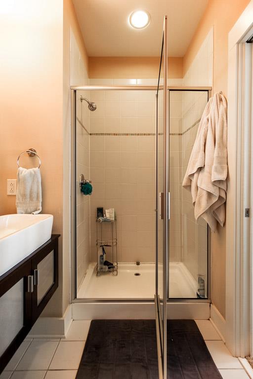 508 Madison Street, Unit 2 Nashville, TN 37208 - Photo 16 of 25 a bathroom with a sink and mirror