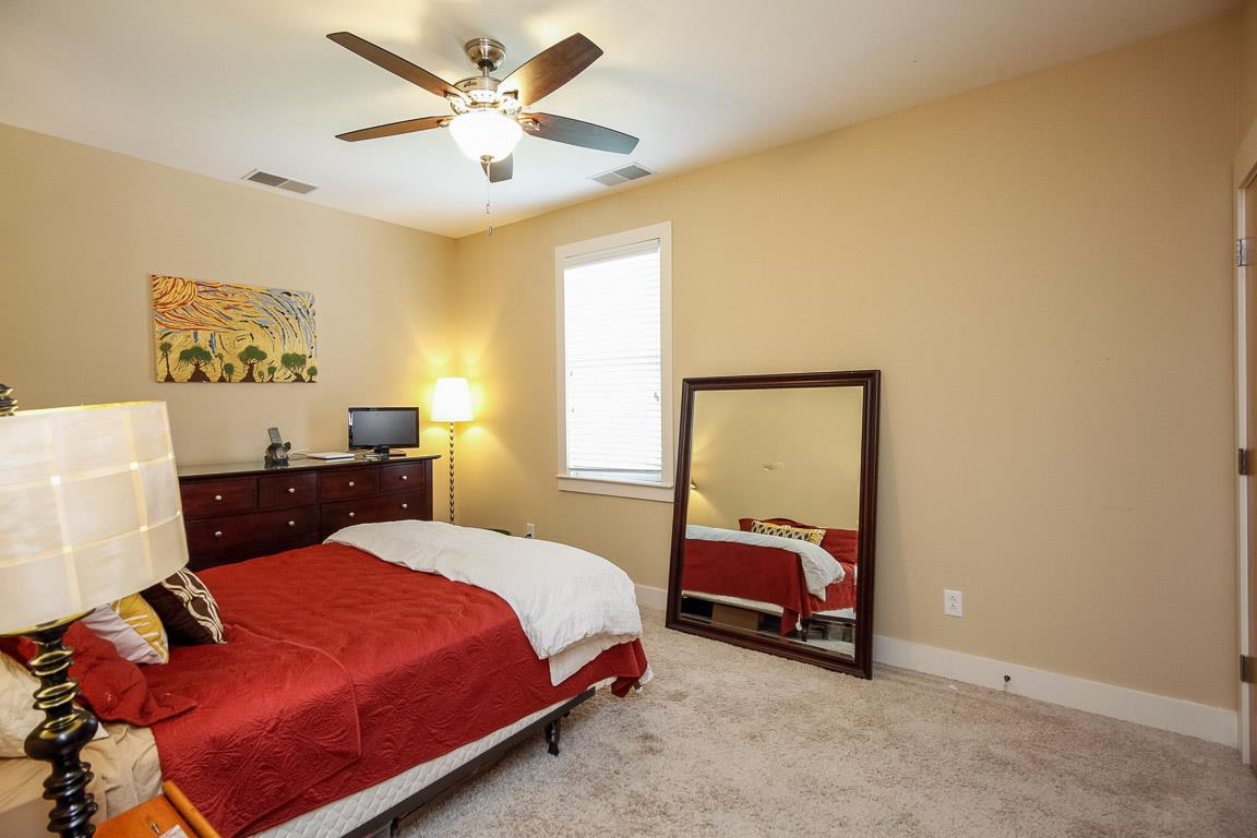 508 Madison Street, Unit 2 Nashville, TN 37208 - Photo 18 of 25 a bedroom with a bed and window