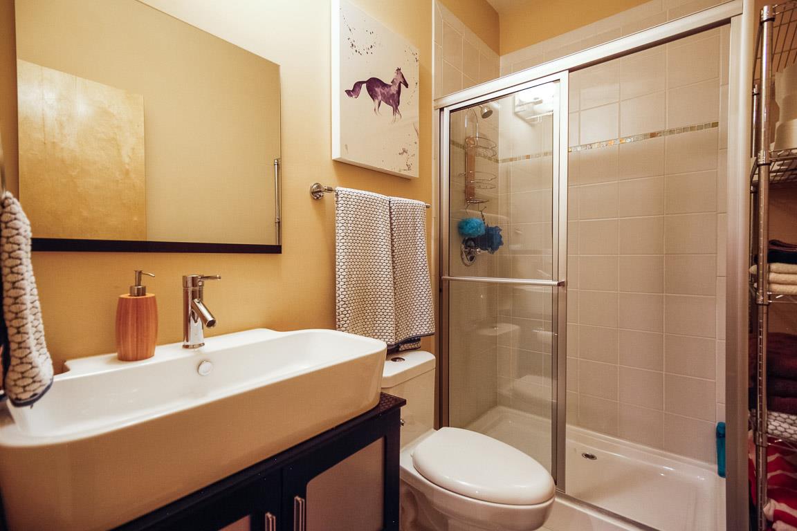 508 Madison Street, Unit 2 Nashville, TN 37208 - Photo 19 of 25 a bathroom with a sink a toilet and shower