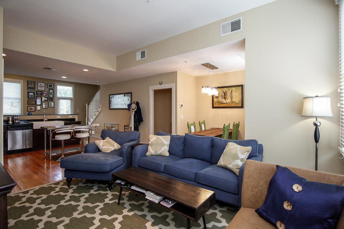 508 Madison Street, Unit 2 Nashville, TN 37208 - Photo 3 of 25 a living room with furniture and wooden floor