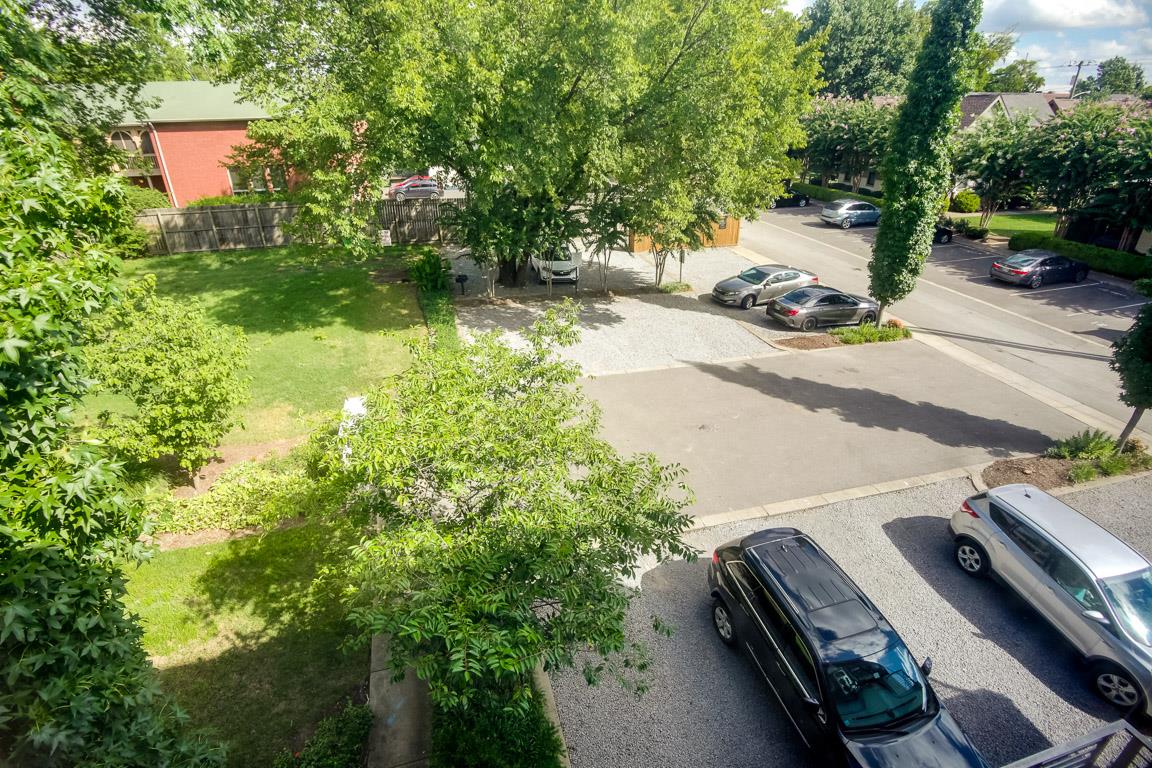 508 Madison Street, Unit 2 Nashville, TN 37208 - Photo 21 of 25 a view of backyard with a car parked in it