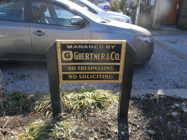 508 Madison Street, Unit 2 Nashville, TN 37208 - Photo 23 of 25 a sign on the side of a building