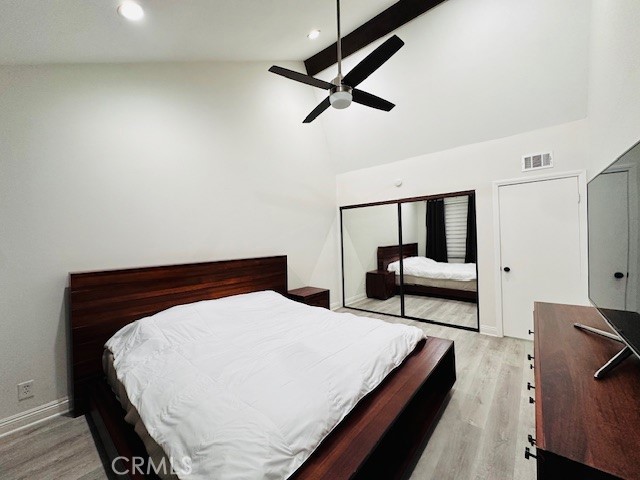 4969 Embassy Way, Unit 6 Cypress, CA 90630 - Photo 11 of 19 a bed room with a bed and a chair