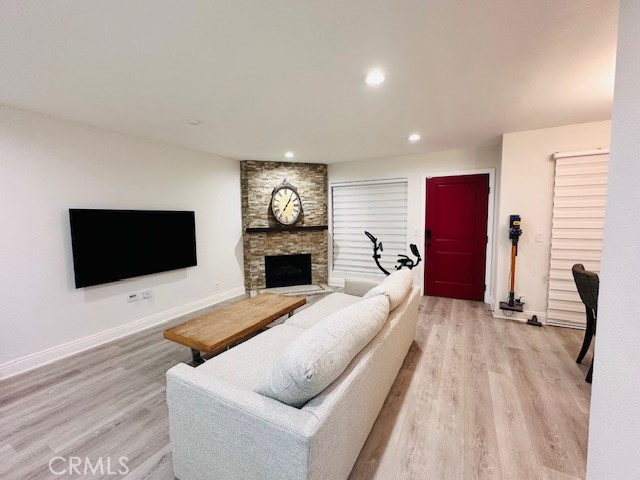 4969 Embassy Way, Unit 6 Cypress, CA 90630 - Photo 3 of 19 a living room with furniture and a flat screen tv