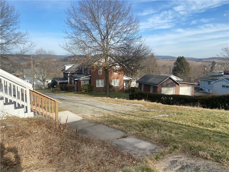 213 Franklin Street, Unit 2 Ligonier, PA 15658 - Photo 23 of 27 a view of a house with a yard
