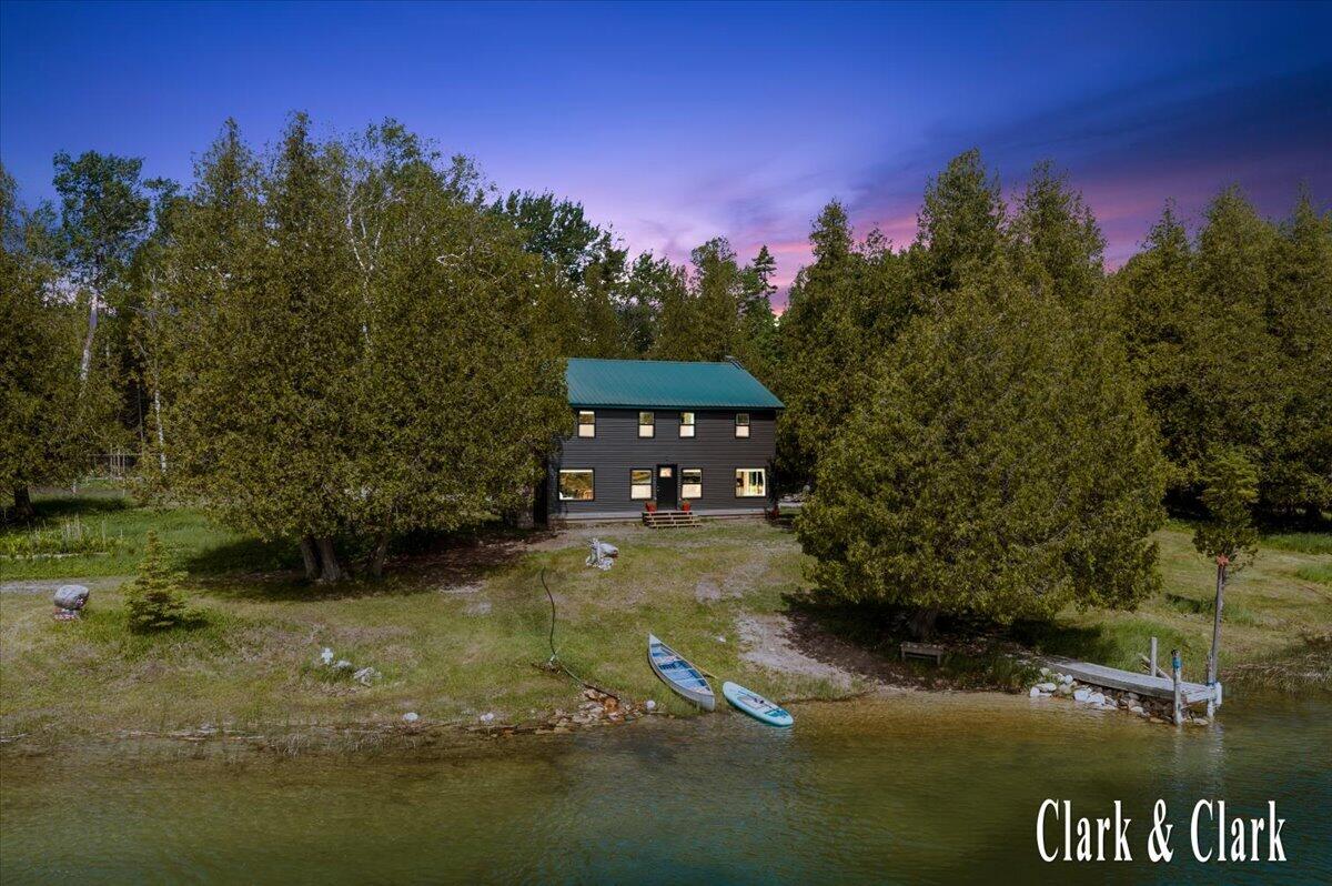 35965 South Humms Road Drummond Island, MI 49726 - Photo 1 of 73 003-DRONE 01A TWILIGHT