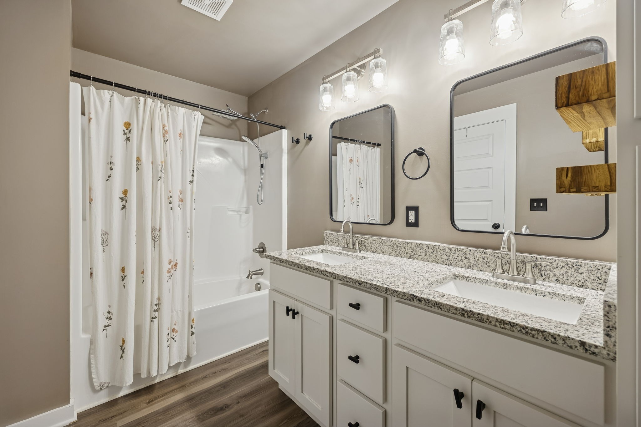 1521 Wixtown Road Westmoreland, TN 37186 - Photo 18 of 33 a bathroom with a granite countertop double vanity sink mirror and