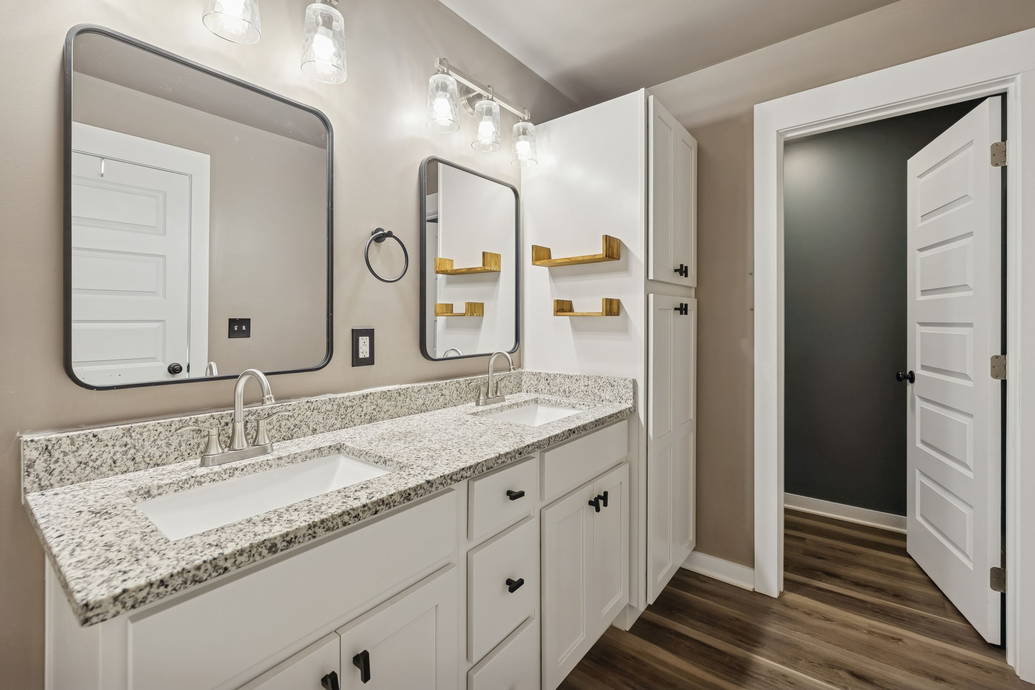 1521 Wixtown Road Westmoreland, TN 37186 - Photo 19 of 33 a bathroom with a granite countertop double vanity sink and a mirror