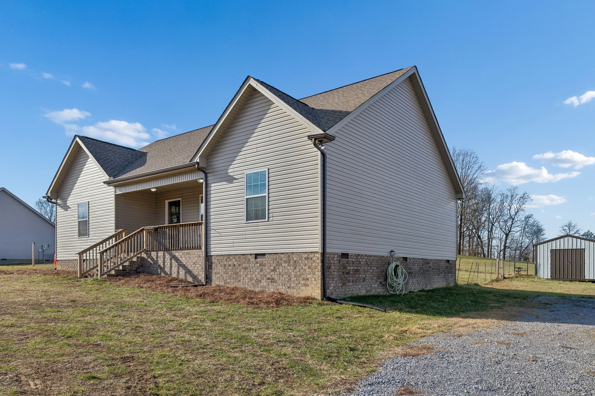 1521 Wixtown Road Westmoreland, TN 37186 - Photo 33 of 33 a view of a house with backyard