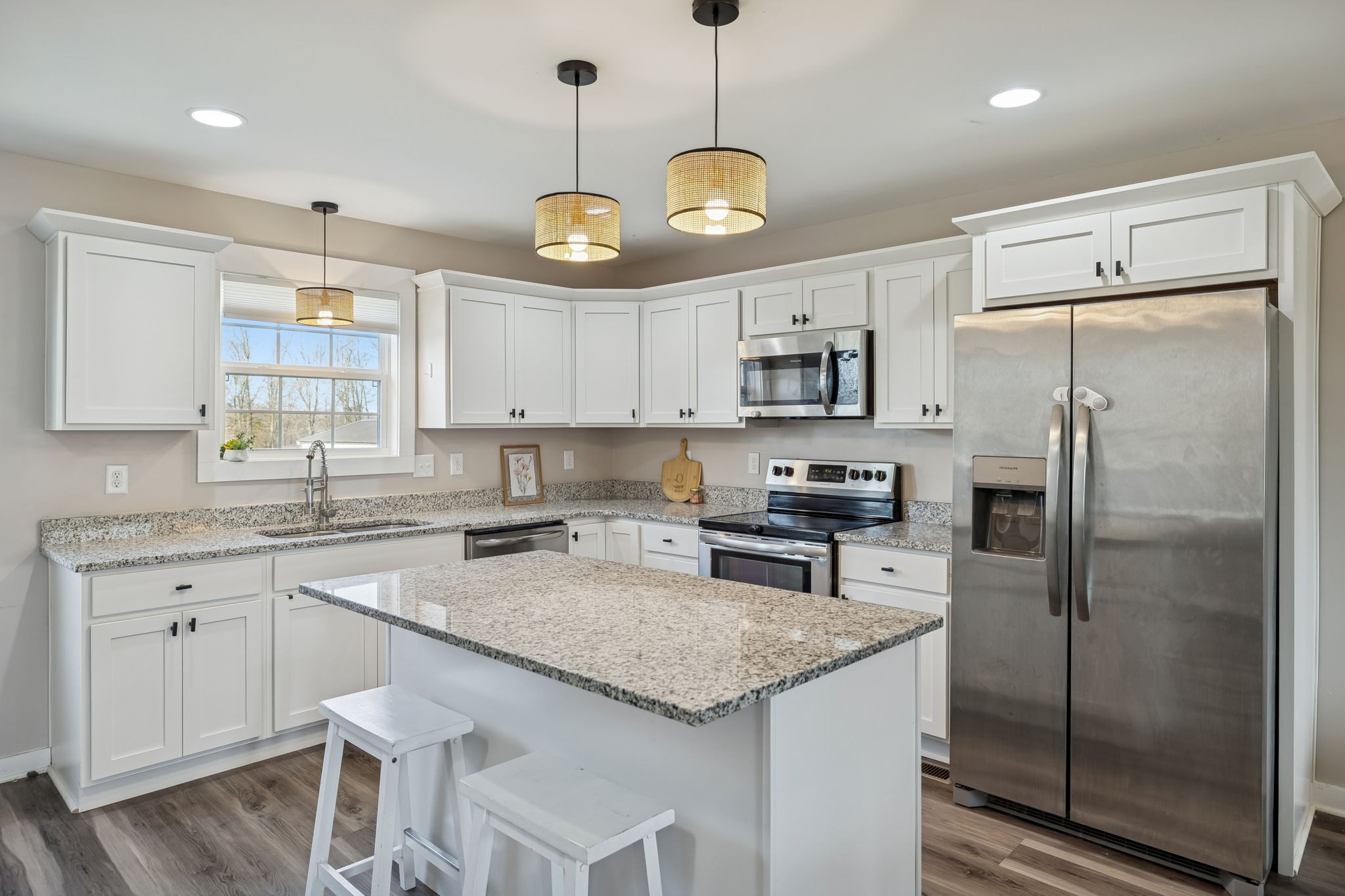 1521 Wixtown Road Westmoreland, TN 37186 - Photo 9 of 33 a kitchen with a center island and stainless steel appliances