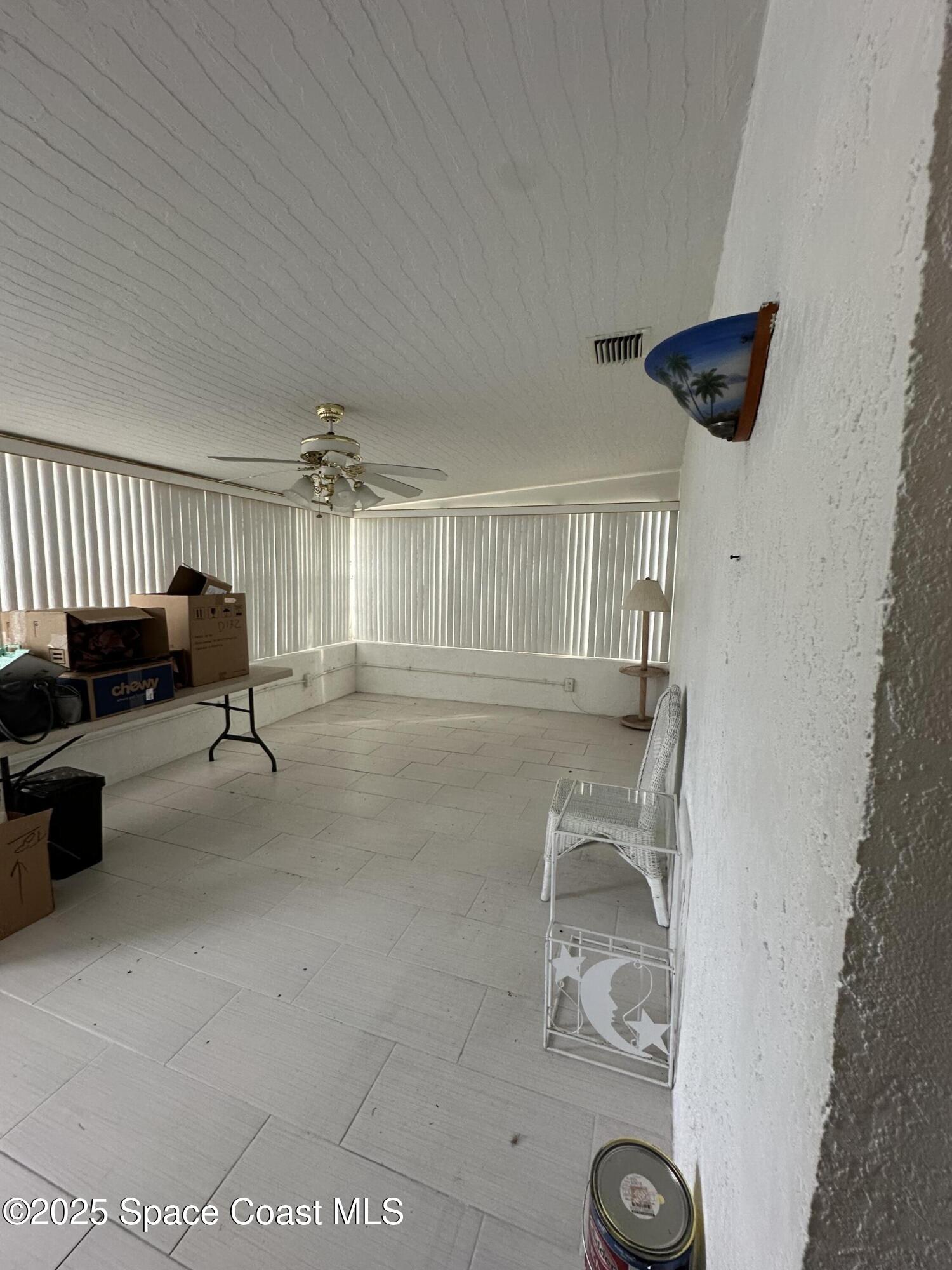 8520 Highway 1, Unit H1 Micco, FL 32976 - Photo 13 of 24 glass room-porch