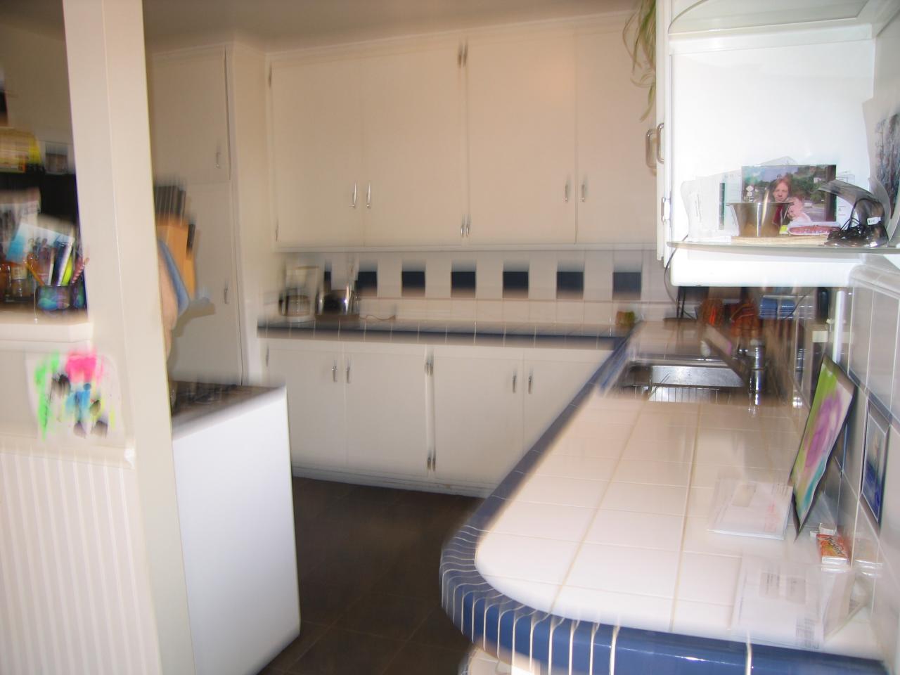 1050 Manitou Road Santa Barbara, CA 93101 - Photo 3 of 8 a view of a kitchen with furniture and a window