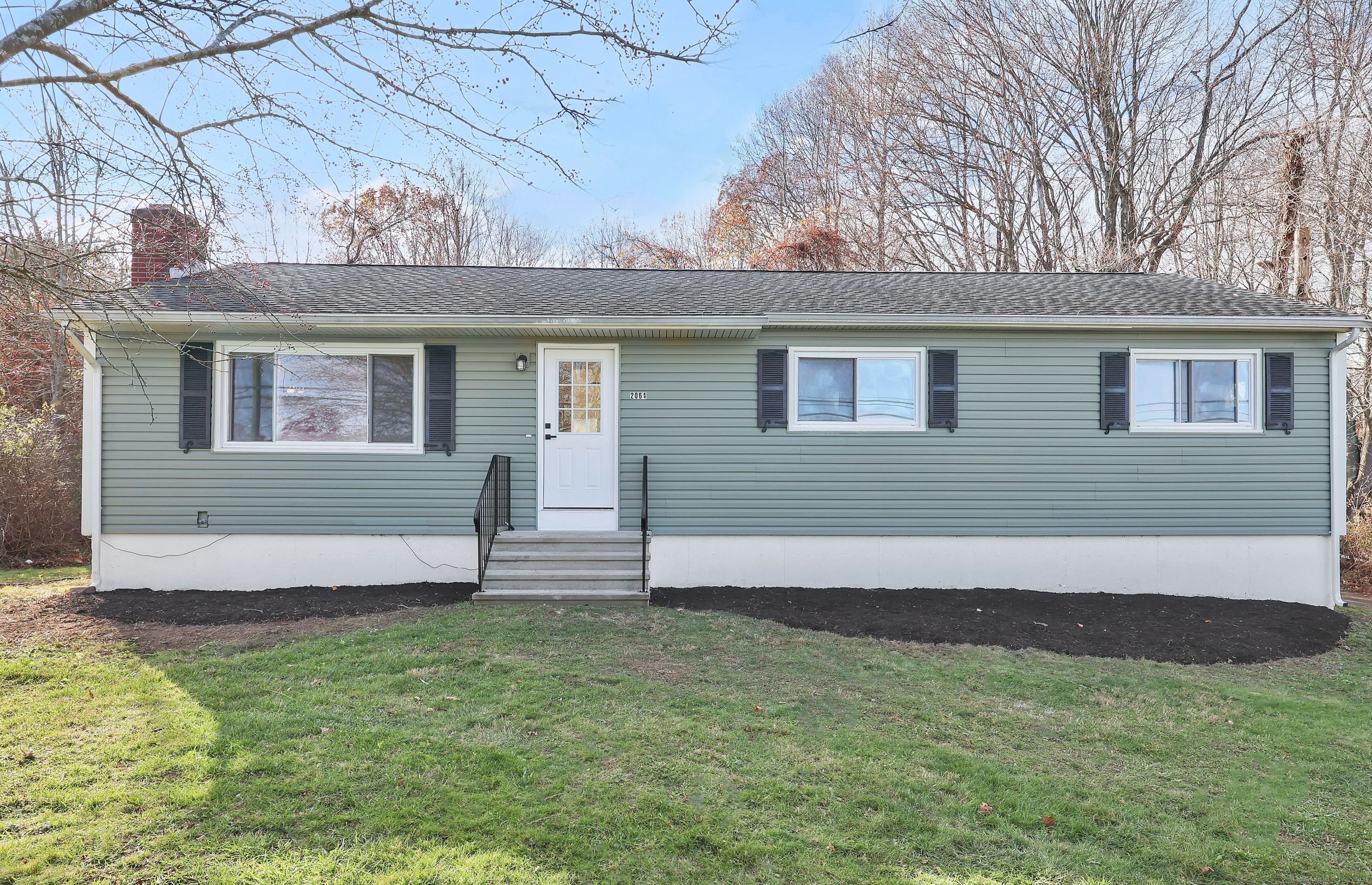 2064 Long Hill Road Guilford, CT 06437 - Photo 28 of 28 front view of house with a yard