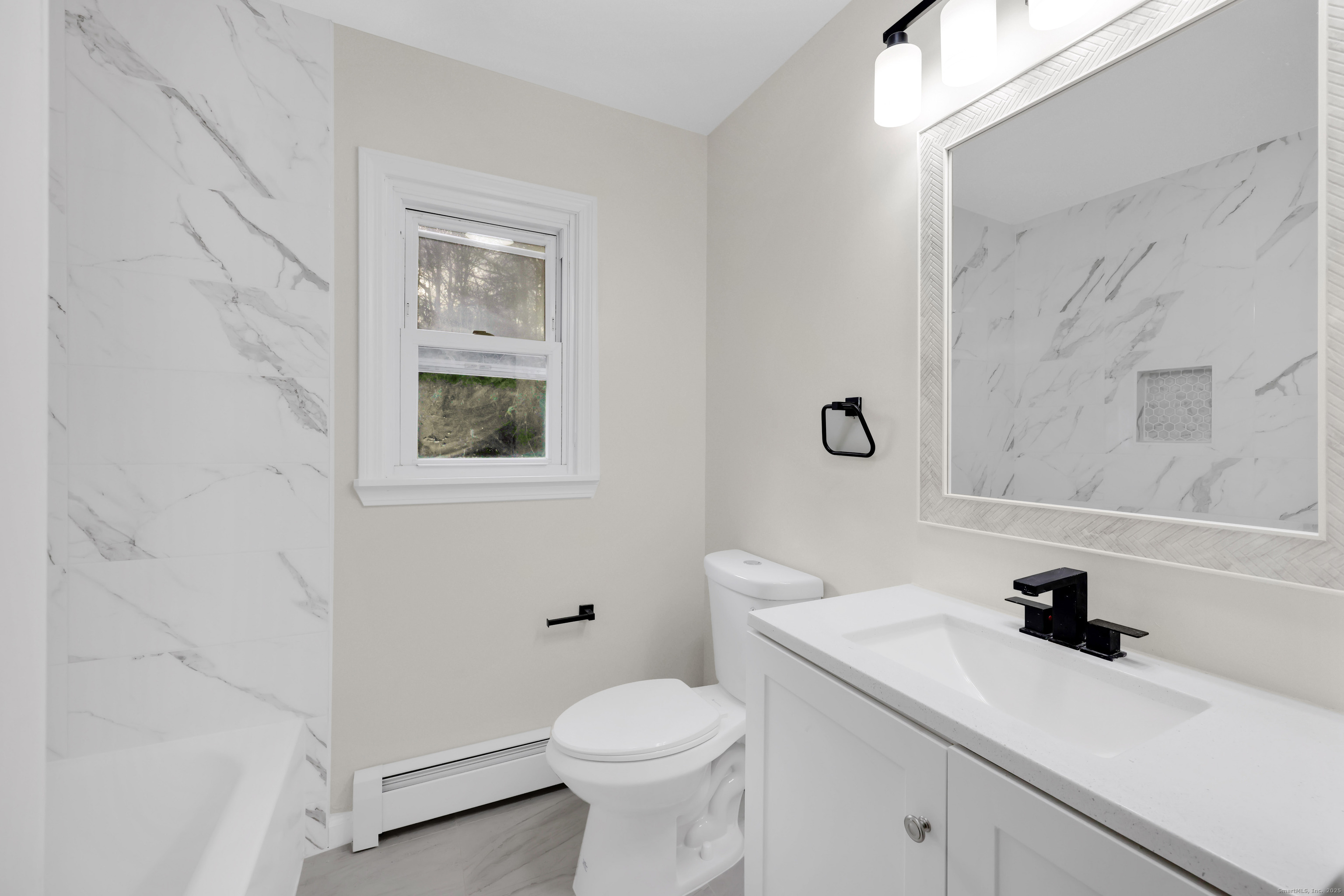 2064 Long Hill Road Guilford, CT 06437 - Photo 4 of 28 a bathroom with a sink toilet and a mirror