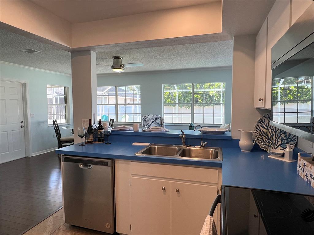 1536 Porpoise Road Venice, FL 34293 - Photo 19 of 33 a kitchen with sink and window