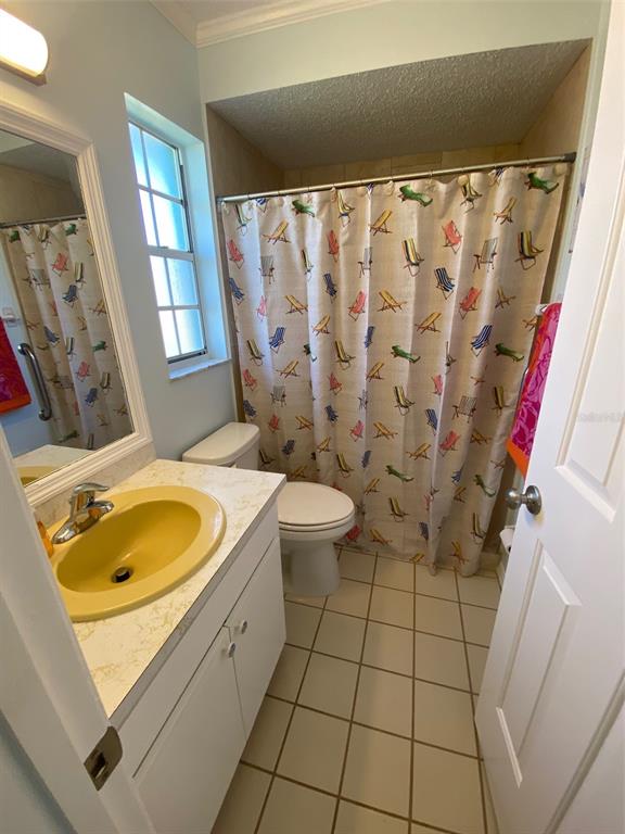 1536 Porpoise Road Venice, FL 34293 - Photo 23 of 32 a bathroom with a sink toilet and shower