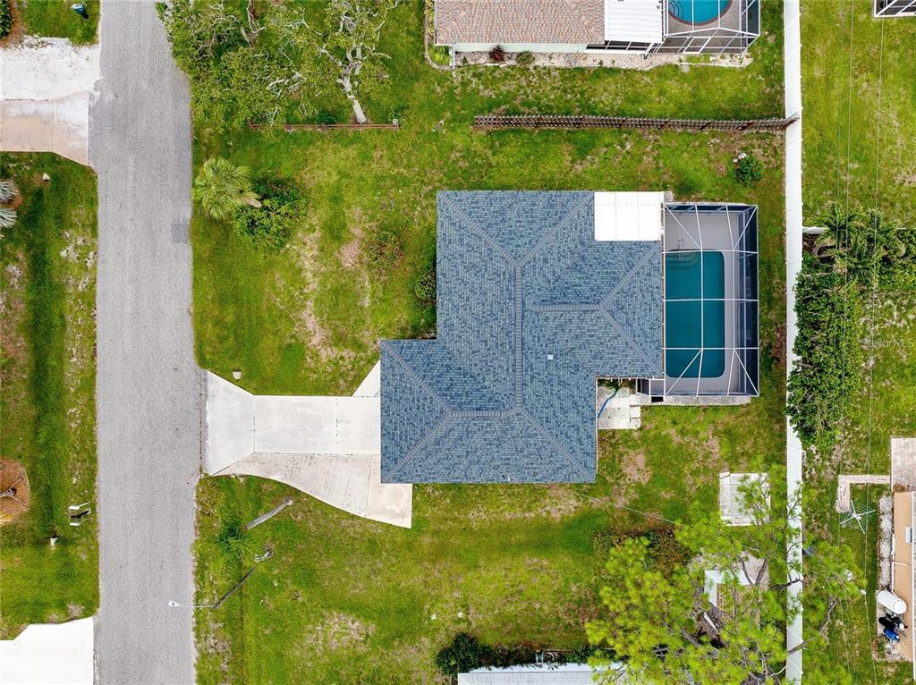 1536 Porpoise Road Venice, FL 34293 - Photo 5 of 32 an aerial view of a house with a yard