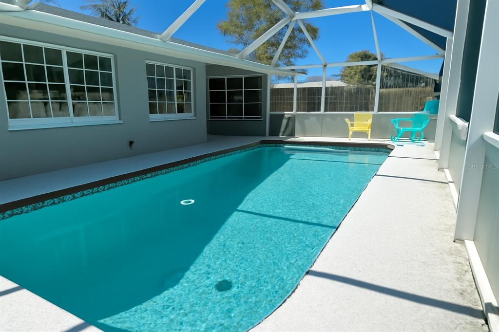 1536 Porpoise Road Venice, FL 34293 - Photo 5 of 33 a view of a house with a backyard