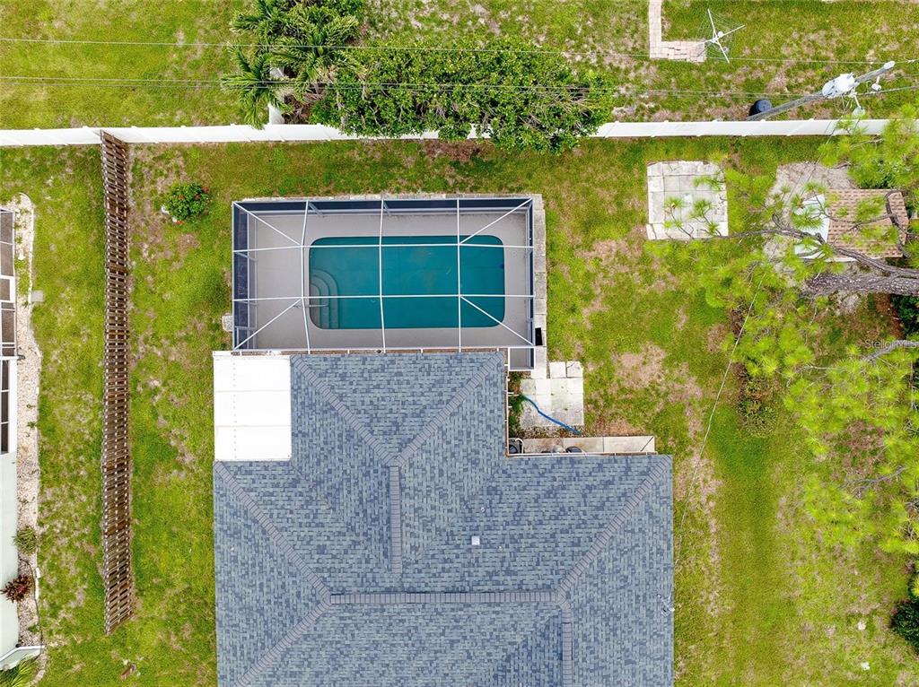 1536 Porpoise Road Venice, FL 34293 - Photo 6 of 32 a front view of a house with a yard