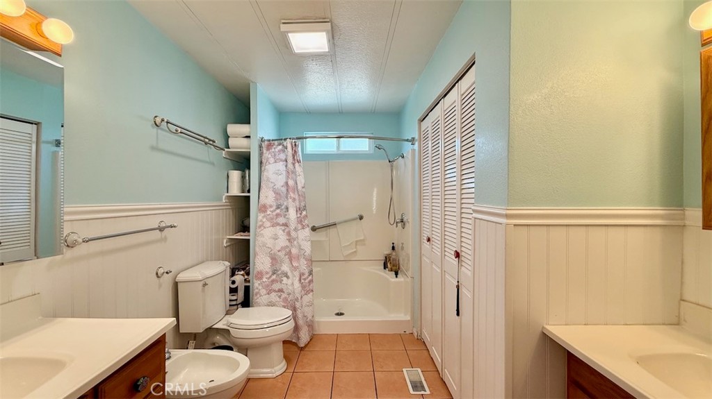23301 Ridge Rte Drive, Unit 47 Laguna Hills, CA 92653 - Photo 11 of 30 Primary bathroom with Bidet