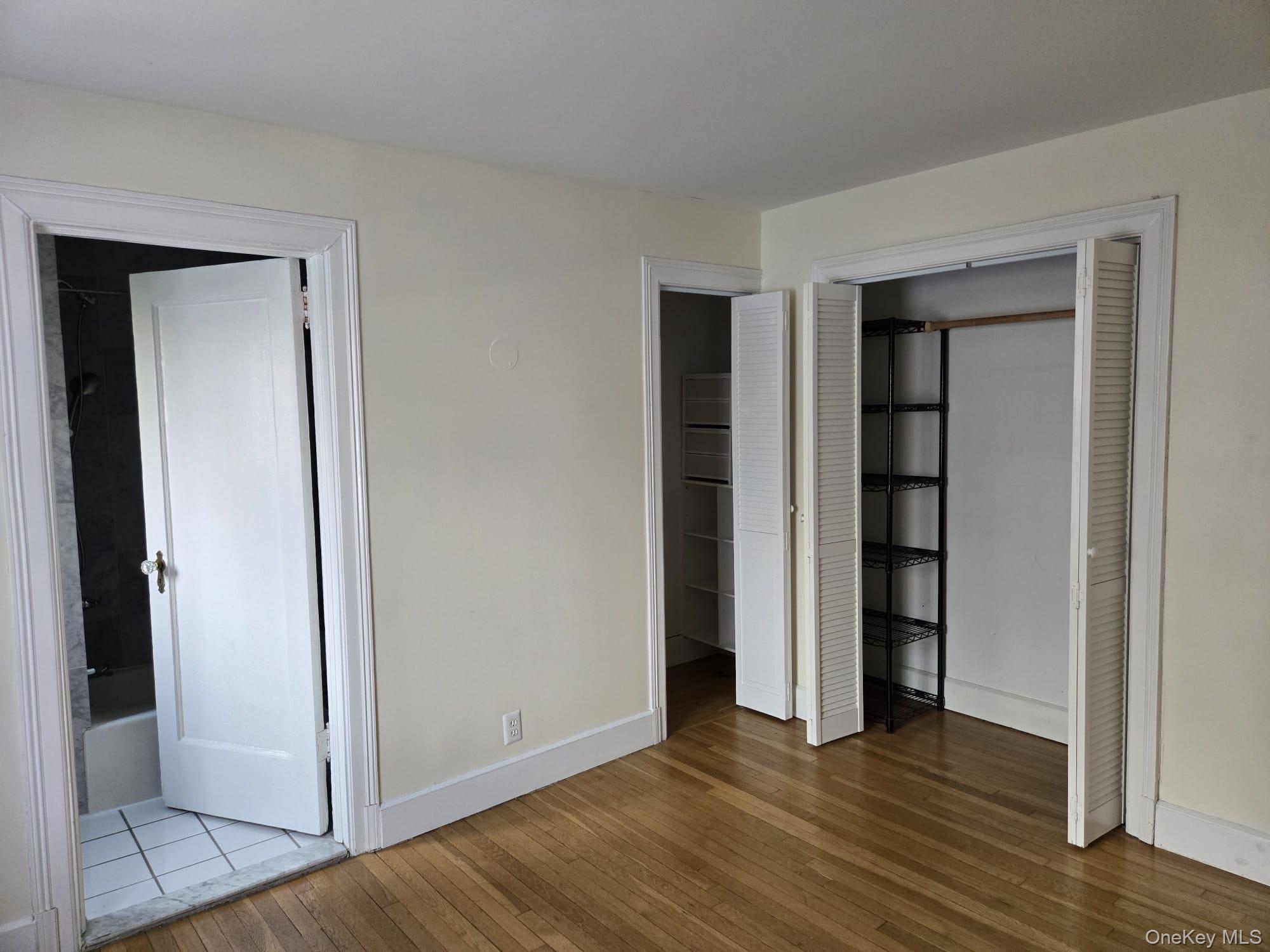 6 Davis Avenue, Unit A11 Rye, NY 10580 - Photo 16 of 23 Another view of Bedroom and closets.