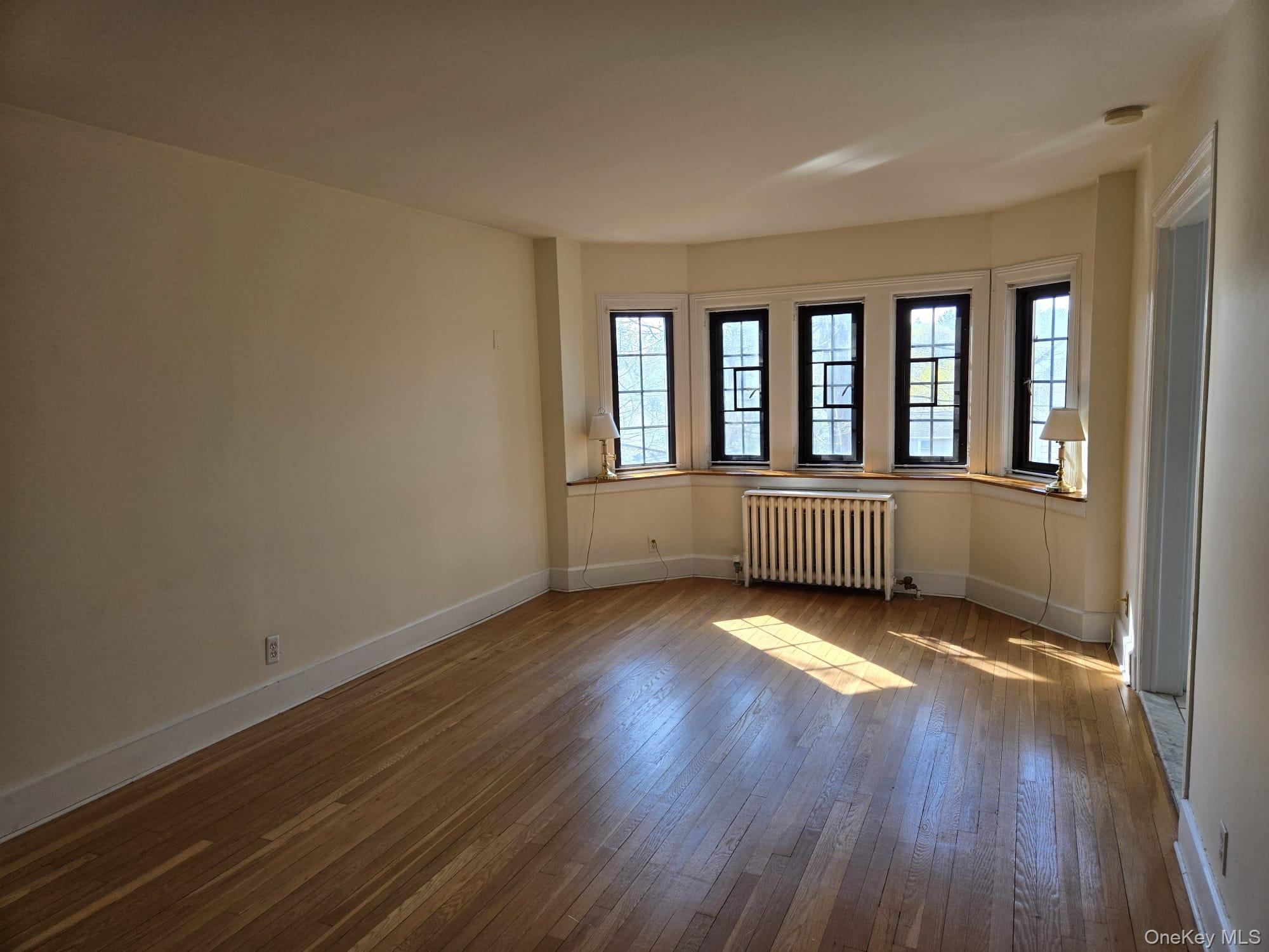 6 Davis Avenue, Unit A11 Rye, NY 10580 - Photo 6 of 23 Living room/Dining room.